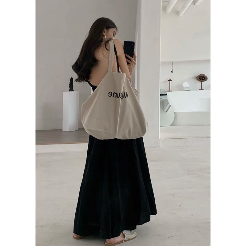 Đầm maxi hai dây hở lưng