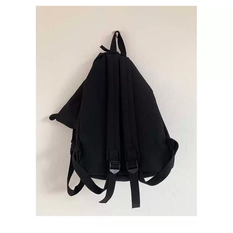 Balo canvas nắp gập màu trắng và đen