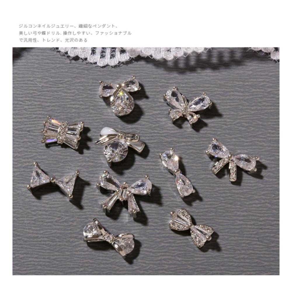 Phụ Kiện Trang Trí Móng Nghệ Thuật Hình Nơ Đính Đá Zircon Màu Bạc Lấp Lánh Thời Trang J4Y3