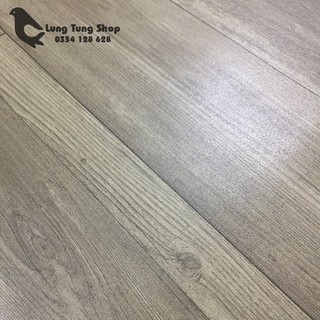 Thảm nhựa simili trải sàn vân gỗ xám - bề mặt nhám hiện rõ vân gỗ như thật