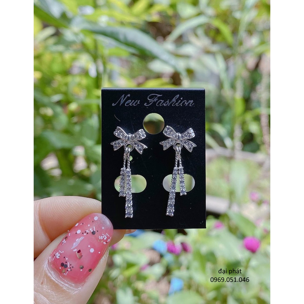 Bông tai bạc , hình cánh nơ gắn đá chắc chắc - vàng bạc đại phát