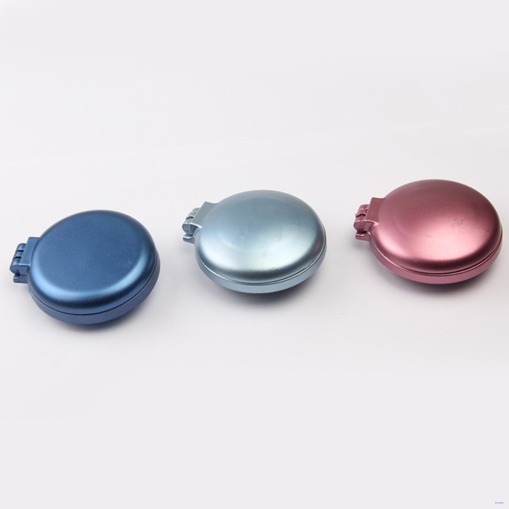 Lược chải tóc gấp gọn được kèm gương tiện lợi để đi du lịch