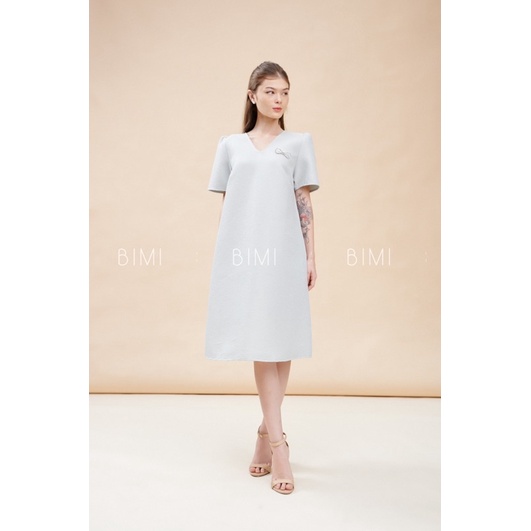 ĐẦM CỔ V KEM TAG NƠ - BIMI