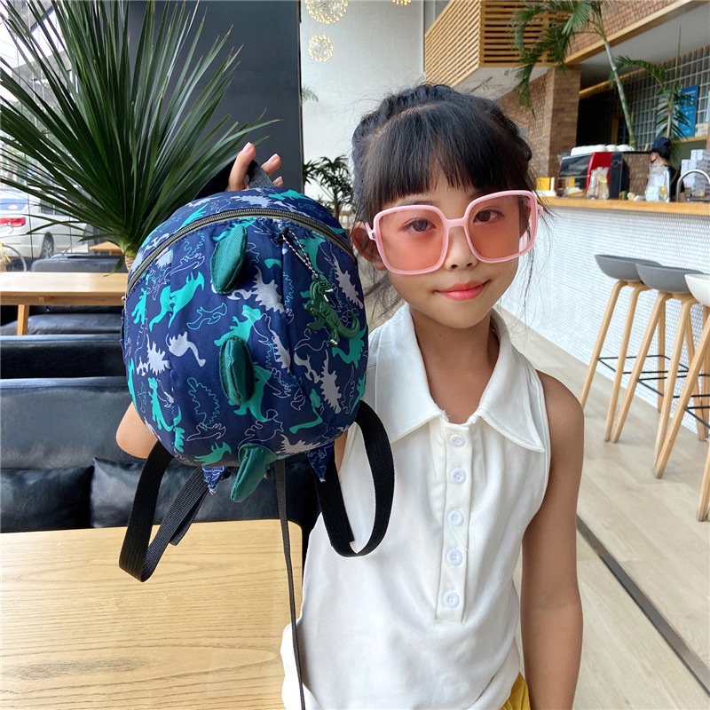 Ba Lô Đi Học Chống Thất Lạc Hình Khủng Long Dễ Thương Cho Bé 1-3-6 Tuổi