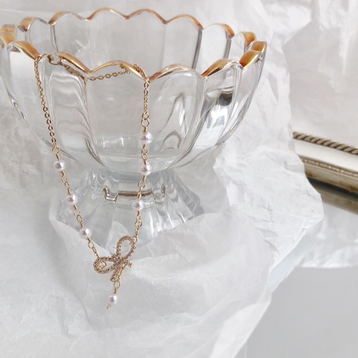 Vòng tay họa tiết nơ đính đá cưng vô đối VT49