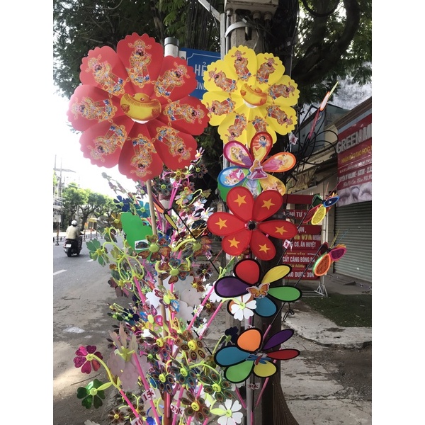 Chong chóng Thần Tài may mắn,  đem lại may mắn cho người bán hàng.