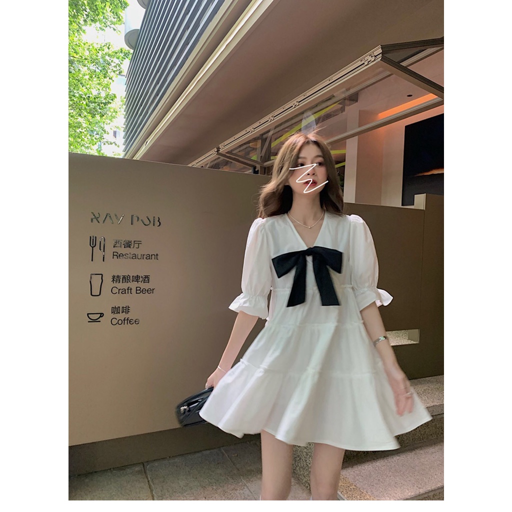 Đầm babydoll nữ ❤️váy tiểu thư trắng xoè cổ v đính nơ❤️ chất thô mềm xếp tầng phông cách hàn quốc VAVASA V26