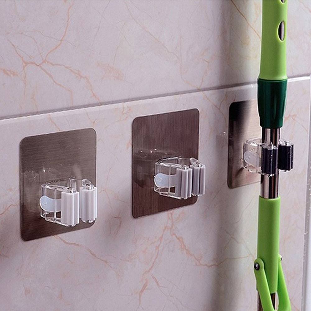 Móc dán tường treo chổi tiện dụng