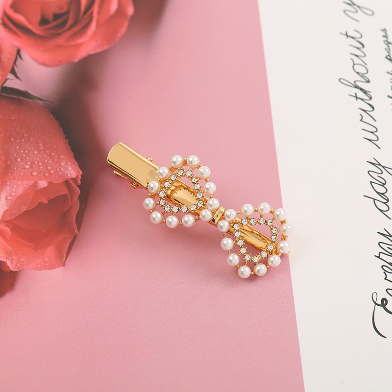 Kẹp tóc ngọc trai giả dễ thương cho bé gái