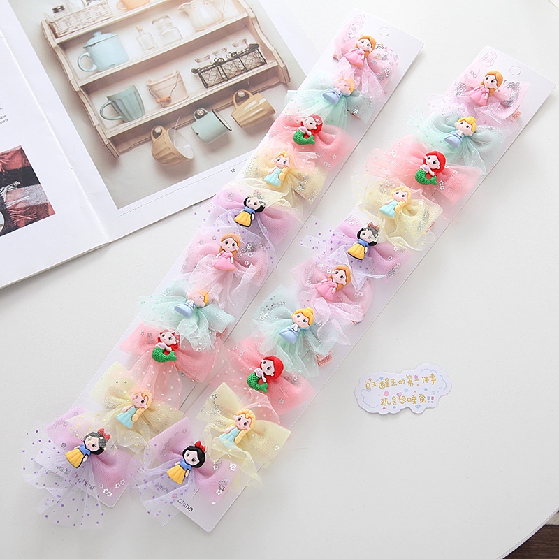 Kẹp tóc cho bé kiểu nơ hoạt hình