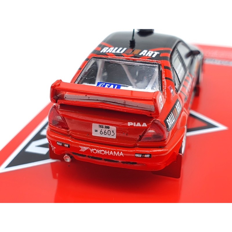 Xe Mô Hình Mitsubishi Lance Evolution VI Winner Rally of Canberra 1999 1:64 Tarmac Works (Đỏ Advan)