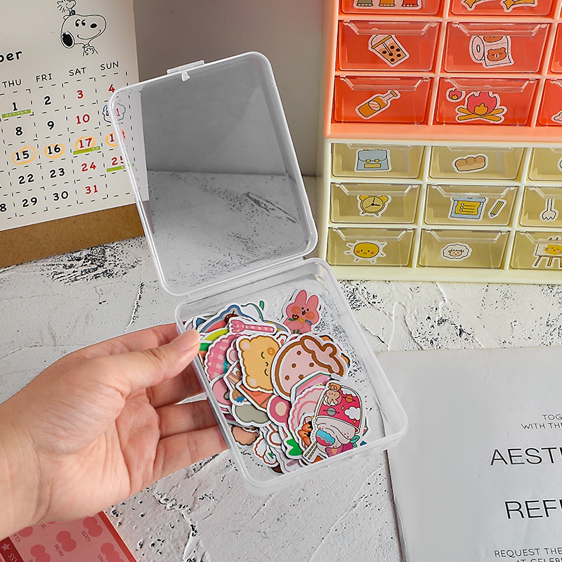 Peach Clear plastic tabletop storage case Organize and store items Student stationery and office supplies