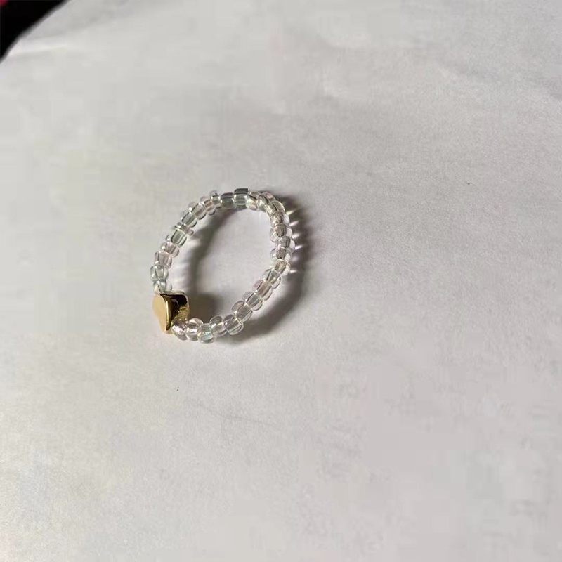 Nhẫn hạt cườm pha lê hình trái tim dễ thương có thể điều chỉnh cho nữ