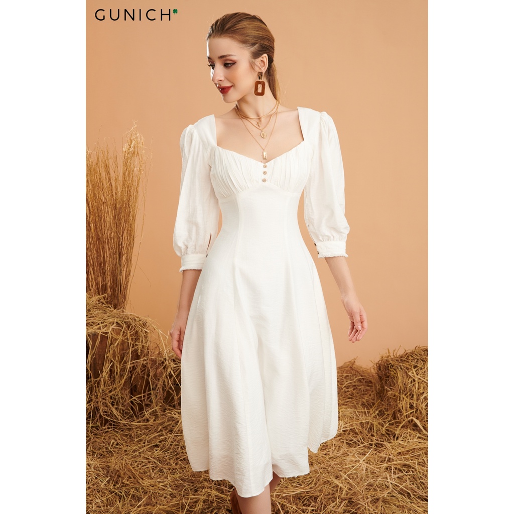 Đầm midi tay lỡ màu trắng Gunich