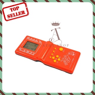 MÁY CHƠI GAME 4 NÚT XẾP GẠCH HUYỀN THOẠI, bấm điện tử tay cầm trắng đen dùng pin, trò chơi tuổi thơ