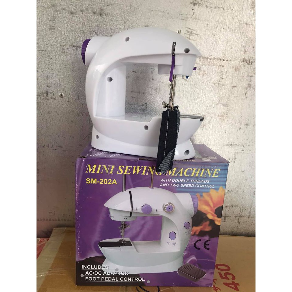 Máy may Mini Sewing Machine SM-202A(trắng phối tím) tiện dụng