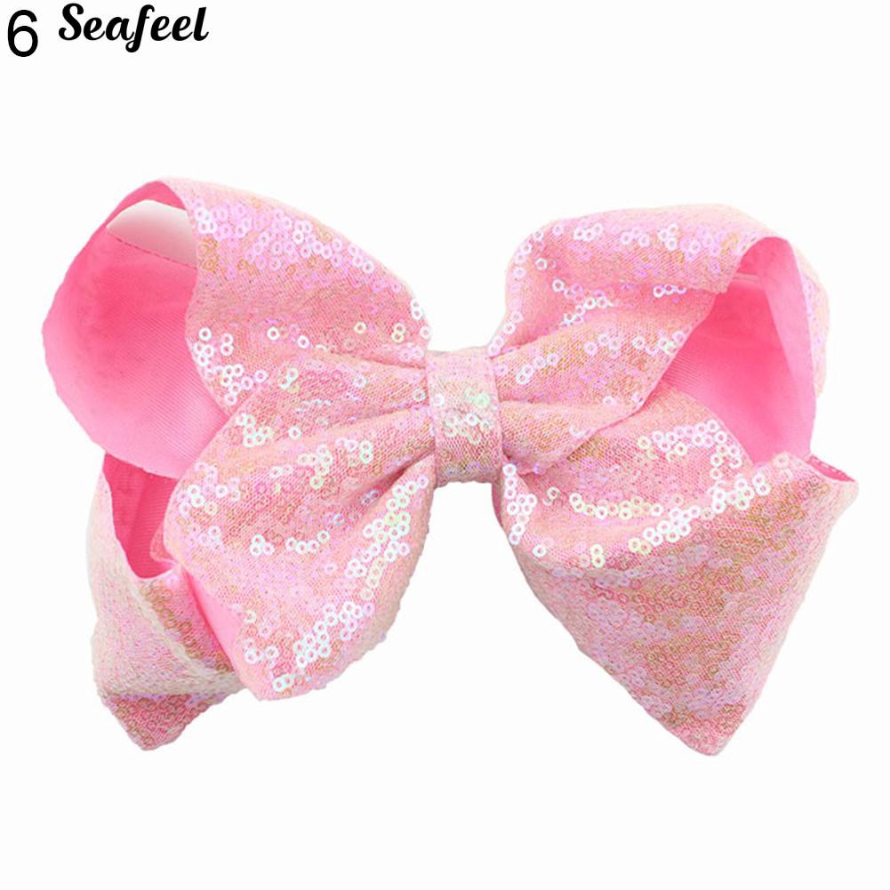 Kẹp tóc hình nơ đính sequin lấp lánh dễ thương dành cho nữ