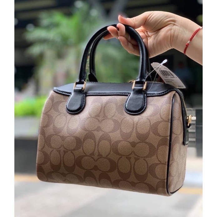 Túi C.oach trống mini logo