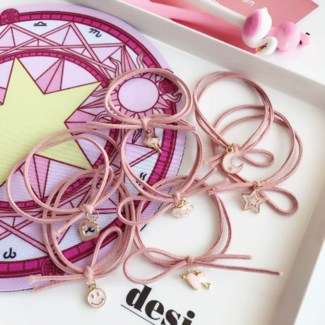 Dây buộc tóc hồng mộng mơ