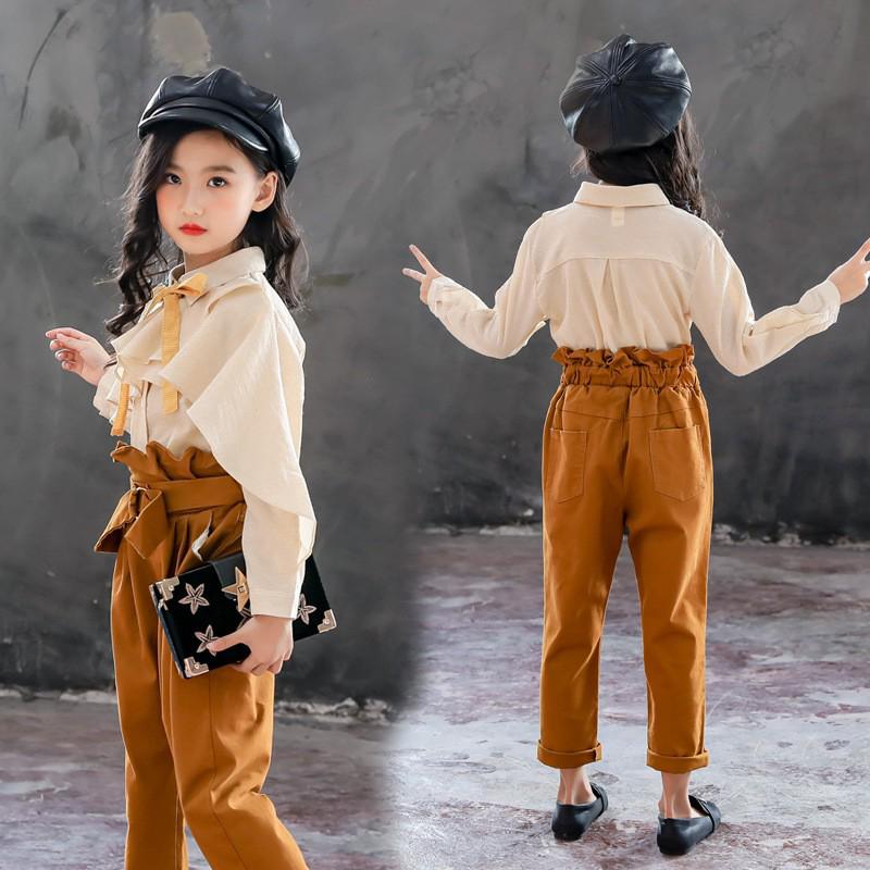 Set áo sơ mi kiểu diềm bèo và quần dài lưng cao có dây cột nơ thời trang cho bé gái
