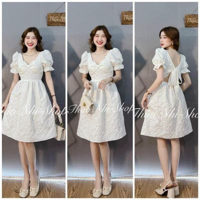 Váy xốp trắng xoắn ngực nơ sau