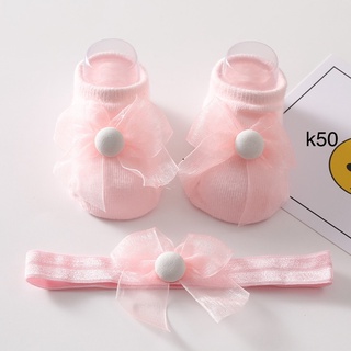 set băng đô và vớ dễ thương cho bé sơ sinh