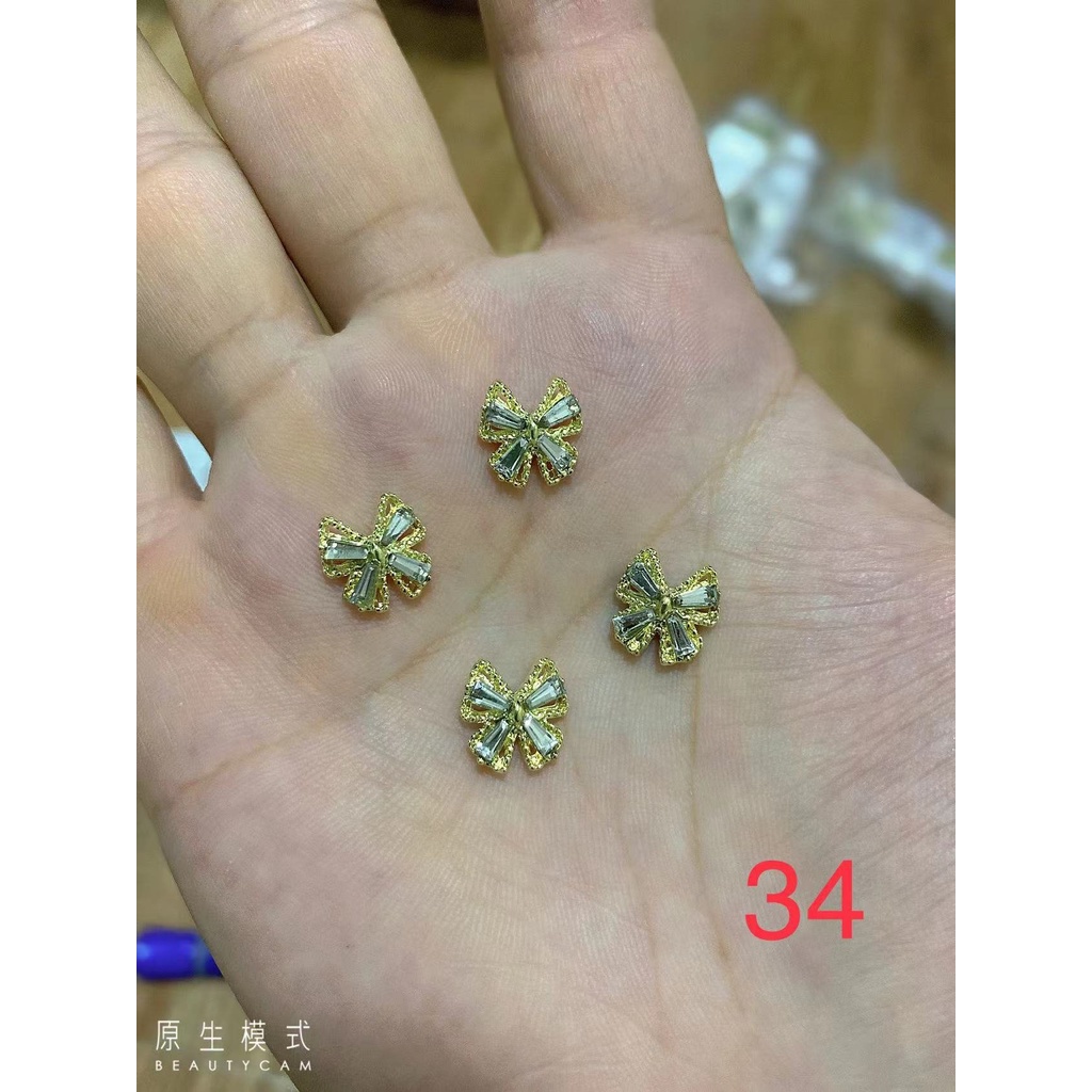 charm trang trí nail mã 34
