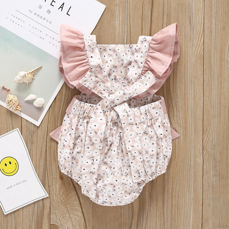 Jumpsuit tay loe hoạ tiết hoa cho bé