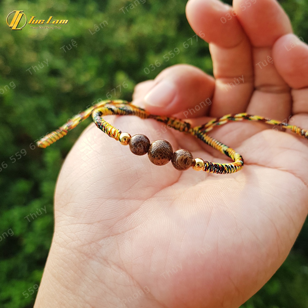 Vòng Tay Handmade Dây Chỉ Bện Hạt Trầm Hương Bi Vàng - Tuệ Lâm