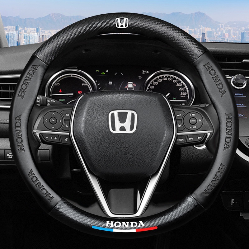 Bọc vô lăng ô tô Carbon logo các hãng thoáng khí chống trơn trượt