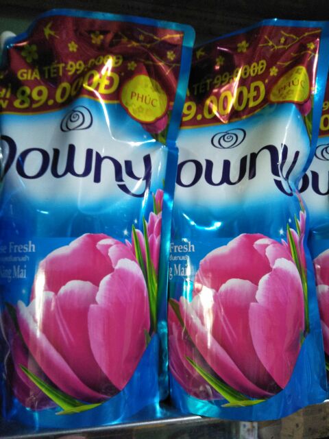 Nước xả vải Downy hương nắng mai 1.5L.