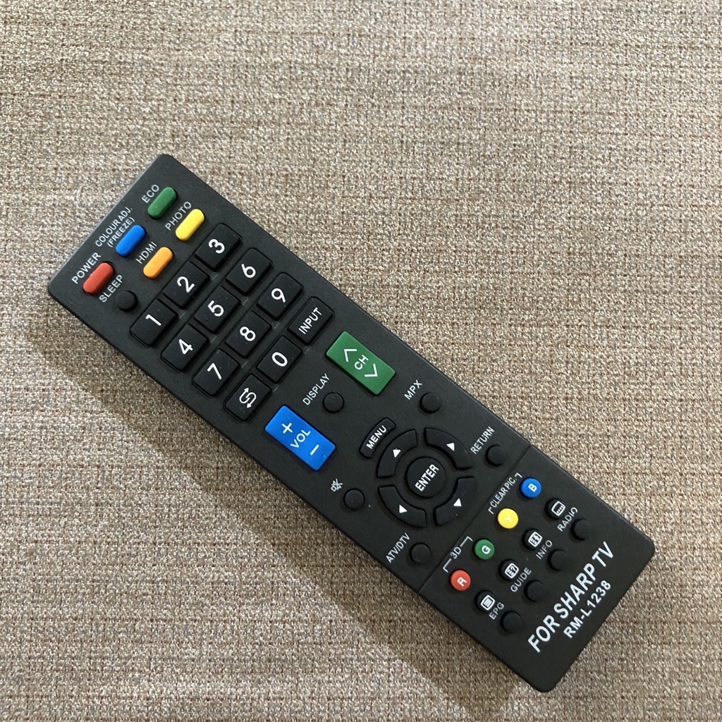 Điều khiển tivi SHARP TV RM-L1238 đa năng - Dùng được cho các tivi sharp hiện nay - Tặng kèm pin và bảo hành 3 tháng