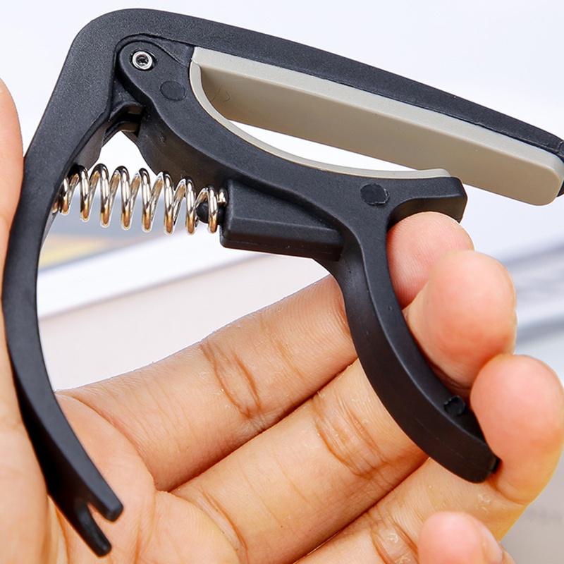 Capo 4 Dây Đàn Guitar 6 Dây Bằng Nhựa Nylon Và Silicone Tiện Dụng