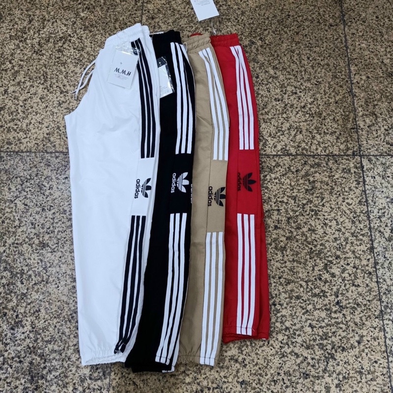 Quần Gió thể thao bo gấu nữ co giãn nhẹ không nhăn Thêu Hit Hot