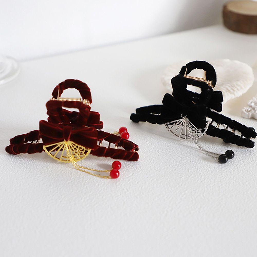 Kẹp Tóc Tua Rua Hình Bướm