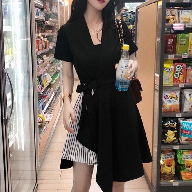 Women's office dress with short sleeves and black skirt
