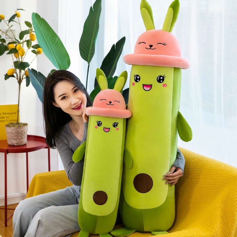 Gấu Bông Trái Bơ Dài Đội Nón Tay Thỏ Size 80cm/1m2 - Gối Ôm Trái Bơ Dài Đội Nón