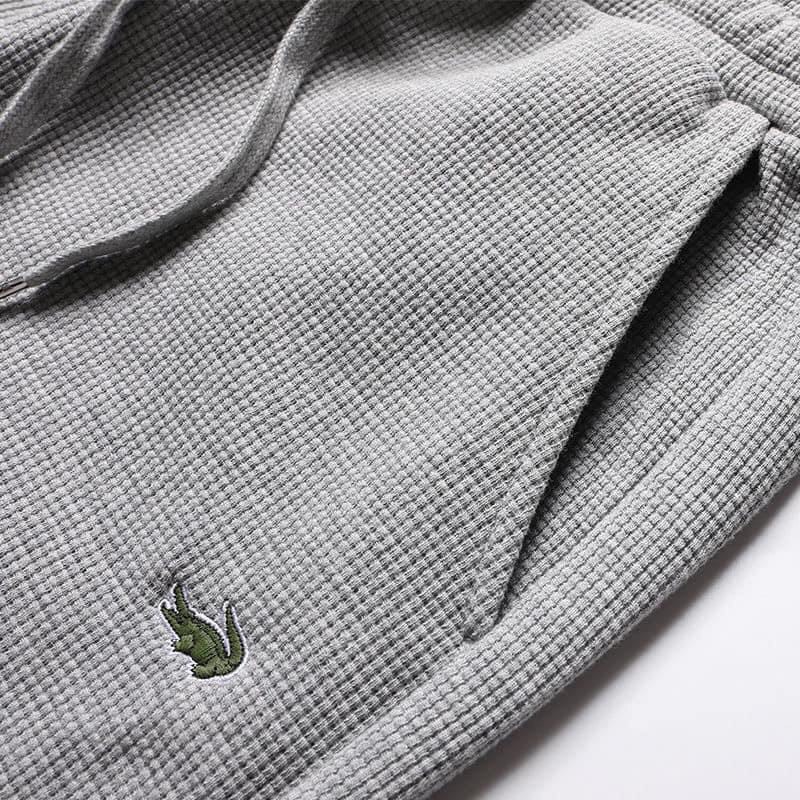 Quần jogger thể thao nam nữ_Quần thun dài nam lacoste thu đông chất liệu thun tổ ong cao cấp