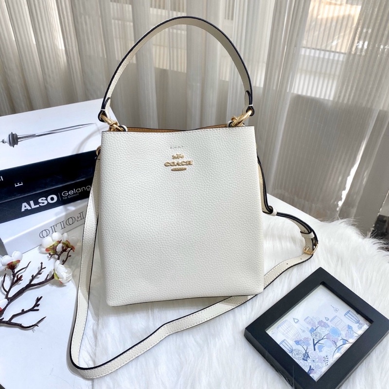 Túi đeo vai kèm dây đeo chéo Co@ch bucket