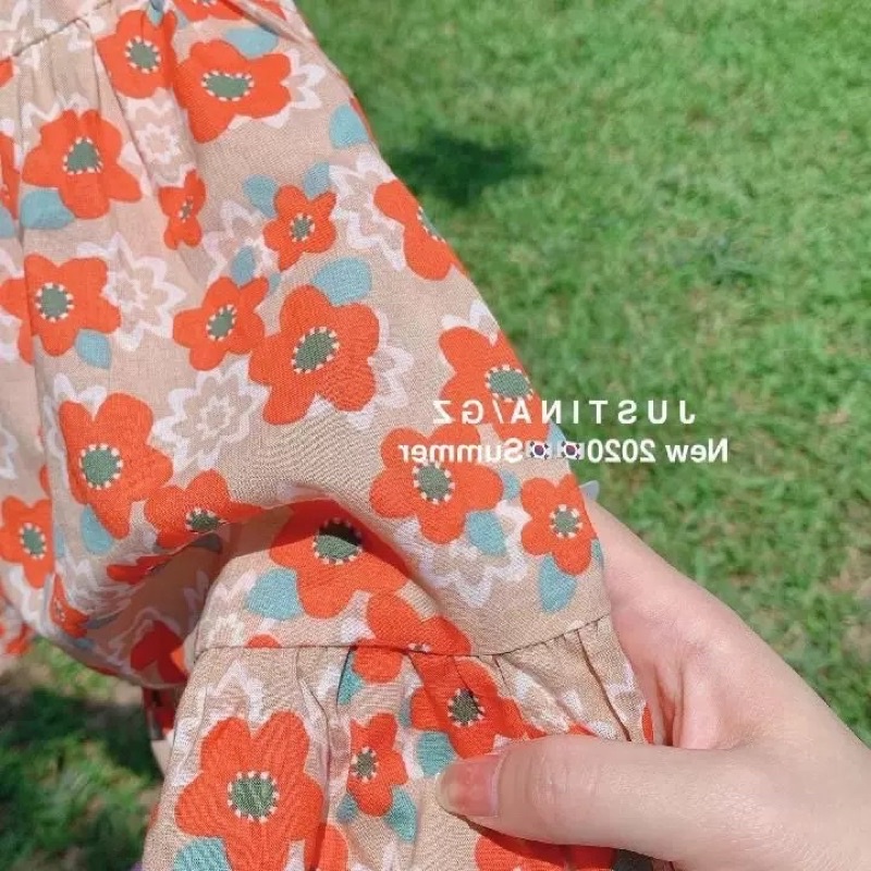 Váy bé gái hoa nhí cam