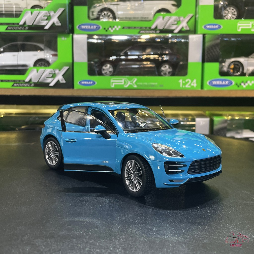 Mô hình xe ô tô Porsche Macan Turbo Hãng Welly FX tỉ lệ 1:24 màu xanh