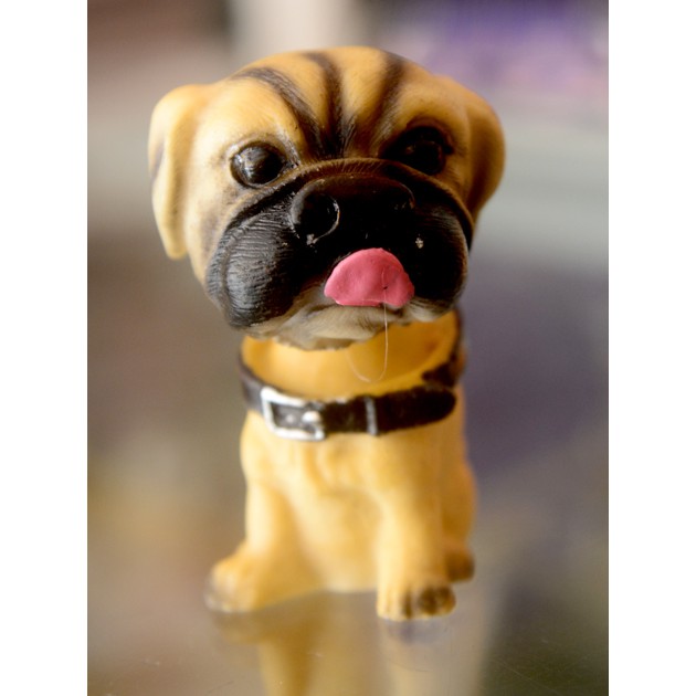 Một tượng chó lò xo lắc đầu để xe hơi ngộ nghĩnh(giá một tượng)