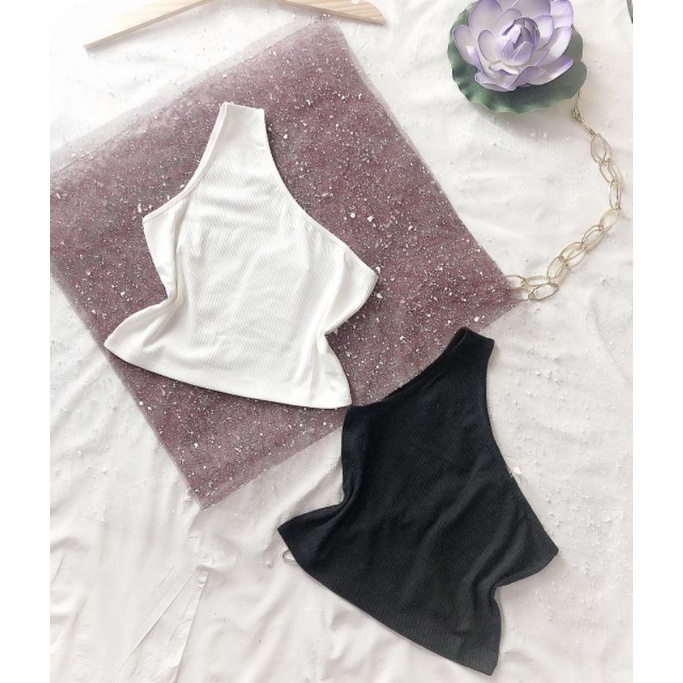 Áo khoét một bên tay