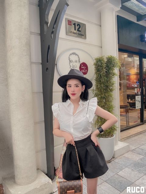 Sơ mi trắng cánh tiên chạy viền đen