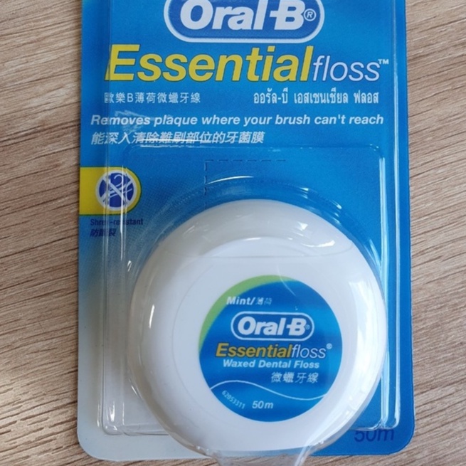 Chỉ nha khoa oral b Esential Floss Waxed Dental Floss - tăm chỉ nha khoa oralb