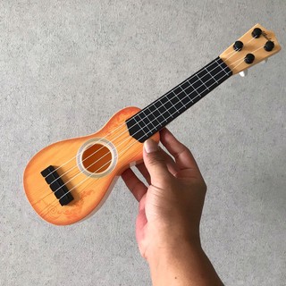 Ukulele siêu dễ thương cho bé tập chơi