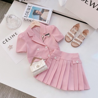 Set vest váy kèm dây xích bé gái
