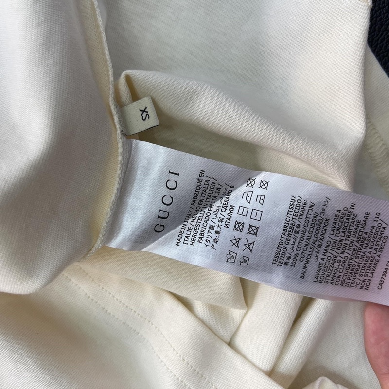 Áo Tee Gu*cci 100 Music Is Mine Màu Off-White