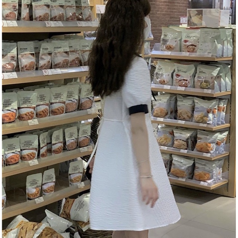 ĐẦM TRẮNG PHỐI CỔ ĐEN NƠ