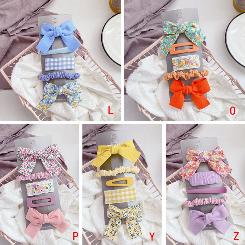 Kẹp tóc vải hình nơ họa tiết hoa ngọt ngào cho nữ